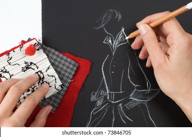 Fashion designer is drawing a fashion model
