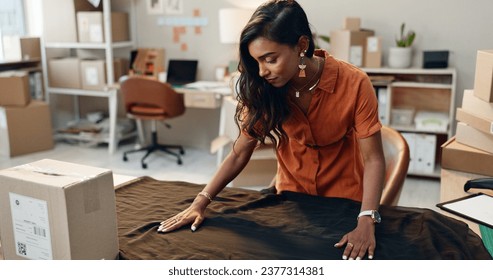 Fashion designer, moving boxes and workshop for startup, fabric and seamstress. Creating, business and design studio for clothes, entrepreneur and creativity as stylist, working and new workplace - Powered by Shutterstock