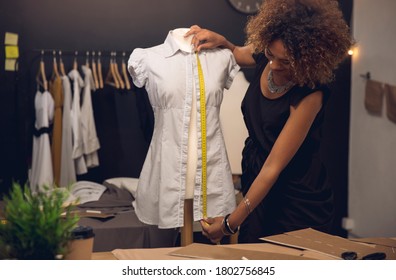Fashion designer on her Atelier - Powered by Shutterstock