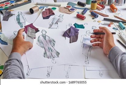 Fashion designer stylish drawings sketches textile fabric material Costume. Designer creative workshop studio.                          - Powered by Shutterstock