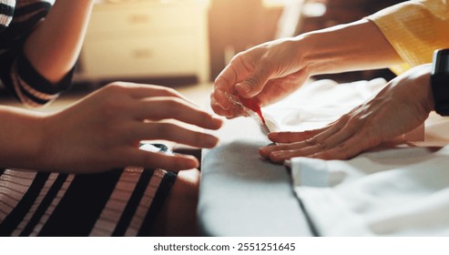 Fashion designer, tailor and hands of women in workshop for stitch, manufacturing or process. Teamwork, boutique business and people with material, fabric or textile for seamstress service in Japan - Powered by Shutterstock