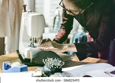 Fashion designer tailor made with sewing machine