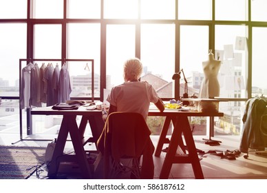 Fashion designer working on her workspace