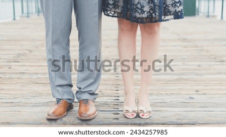 
Fashion, Feet, Footwear Two mannequins, male and female, dressed in casual clothes. Isolated on grey background