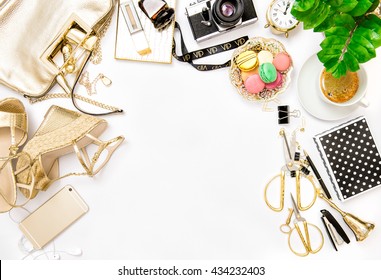Fashion flat lay for bloggers social media. Feminine accessories, bag, shoes, office supplies, vintage no name photo camera and green plant on white background