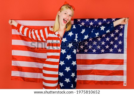 Fashion girl with american flag. Independence day celebration. 4th July. Patriotic costume. National colors USA.