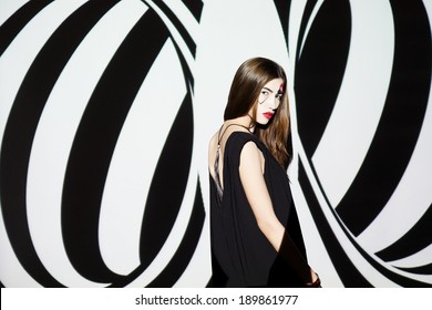 Fashion Girl On Black And White Geometric Background