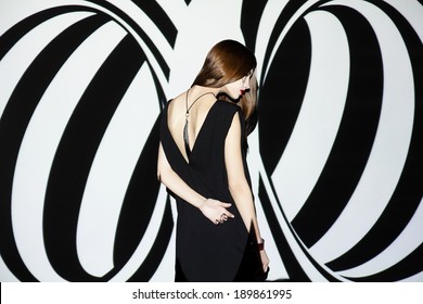 Fashion Girl On Black And White Geometric Background