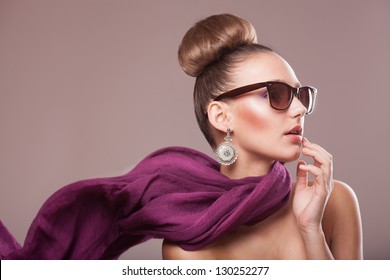 fashion girl with a purple scarf, wearing sunglasses, updo