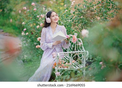 Fashion girl reading in the garden