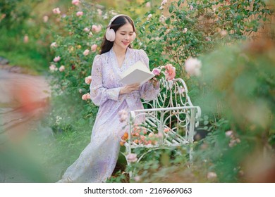 Fashion girl reading in the garden