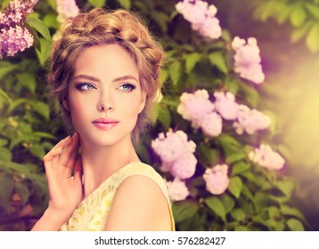 Fashion Hair Disheveled Braid Around The Head .Happy Beautiful Young Model Girl In Summer Blossom Park.