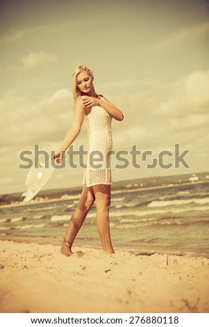 Similar – Young, slender, long-legged woman on a Baltic beach in a summer dress