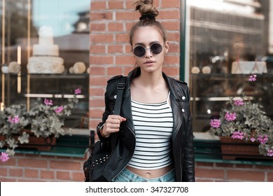 Fashion Hipster Cool Girl In Sunglasses.