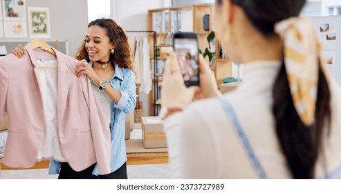 Fashion influencer, cellphone and women live streaming clothes presentation, style review or mobile app broadcast. Phone, content creator team and small business owner teamwork on retail commercial - Powered by Shutterstock