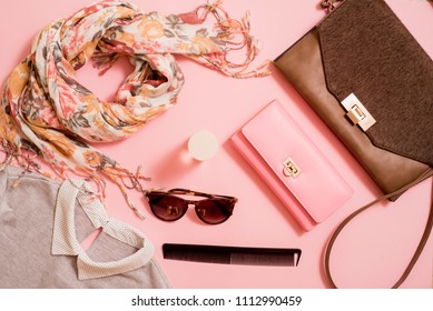 Fashion lady accessories set. Falt Lay. Stylish handbag. Make-Up brushes. Summer sunglasses. Jewelry and nail polish. Women accessories. Trendy fashion design. - Shutterstock ID 1112990459
