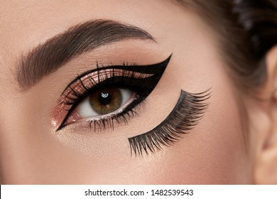 Fashion Make-up Closeup With Eyeliner And False Eyelashes Under Eye, Make-up Art With Cat Eyes, Glamorous Evening Style