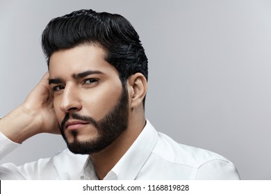 Fashion Man Portrait. Male Model With Hair Style And Beard