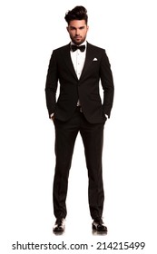 Fashion Man In Tuxedo Standing With Hands In Pockets, Full Body Picture On White Background