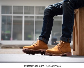 Fashion men with jeans and brown boots leather. - Powered by Shutterstock