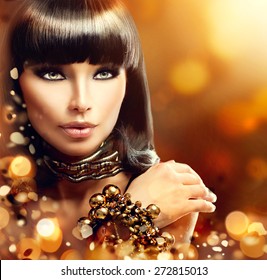 Fashion model brunette girl golden accessories stock photo edit now