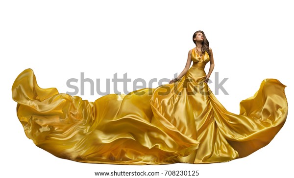 ファッションモデルドレス 女性が長いガウンで踊る なびく金絹の布 白い背景に美しい女の子 の写真素材 今すぐ編集