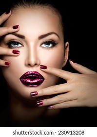 Fashion model girl face, beauty woman make up and manicure. Makeup closeup, perfect skin, manicured nails, deep violet color. Smoky eyes holiday luxury make-up, blue eyes