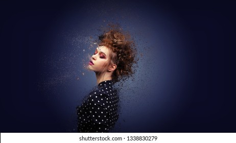 Fashion model girl portrait with colorful powder make up Beauty woman with bright color makeup Art design.  Copy space. Photoshop Effects Dissolving Face Into Pieces