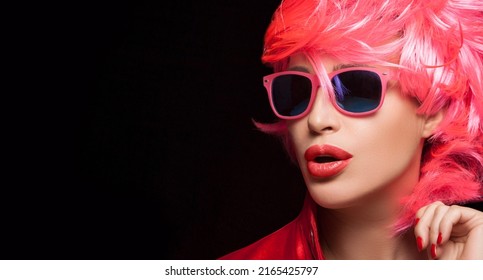 Fashion Model Girl With Stylish Pink Hair And Sunglasses. Dyed Hair And Fashion Concept. Isolated On Black Background With Copy Space