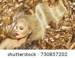 Fashion Model Hairstyle and Beauty Makeup, Woman Waving Golden Color Hair Style and Beautiful Make Up, Gold Fabric Background