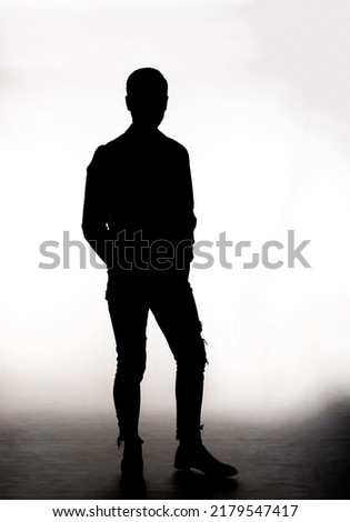Fashion model posing in front of the camera in the studio