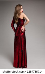 Fashion Model Red Sparkling Dress, Elegant Woman In Long Evening Gown, Girl Studio Portrait, Back Rear View