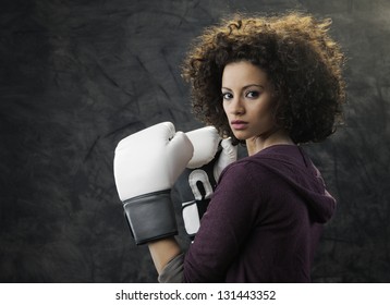 Fashion Model With White Boxing Gloves