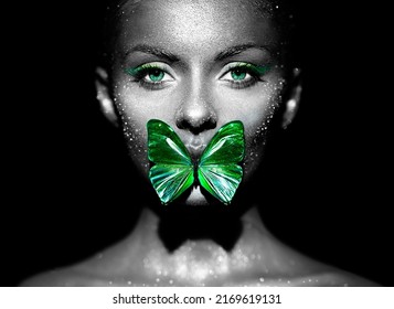 Fashion Model Woman In Bright Sparkles And Lights Posing In Studio. Portrait Of Beautiful Woman With Butterfly. Art Design Glitter Glowing Make Up. Black And White Photography