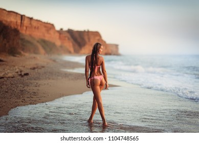 Fashion Outdoor Photo Of Beautiful Woman With Blond Hair In Sexy Bikini Relaxing On Summer Beach