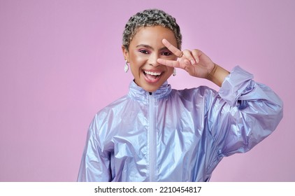 Fashion, Peace And Woman In Studio Portrait With Peace Sign And Fancy Jacket And Cool Hairstyle With A Big Smile. Happy, Excited And Young Girl In Funky Nice Modern Clothes Alone With Mockup Space