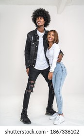 Fashion Photo Of Attractive African American Couple Hugging, Posing Together In Studio. White Studio Background. Real People Emotions And Relationship Concept.