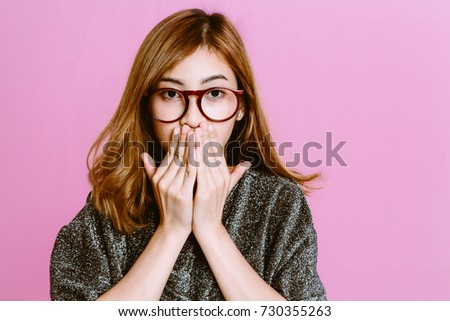Fashion photo of young girl on pink background