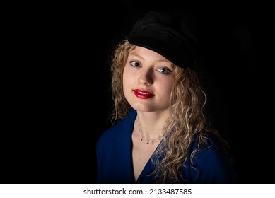 Fashion Portrait Of A 21 Year Old White Blonde Woman Wearing A Hat