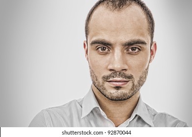 Fashion Portrait Of Adult Handsome Business Man Looking At Camera