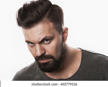 Fashion Portrait Of A Brutal Bearded Man.isolated Handsome Hipster Man With Beard