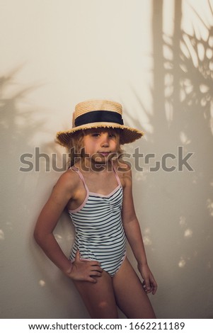 Similar – On the road in Venice. A girl stands on a bridge.