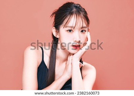 Fashion portrait of stylish young Asian woman. Skin care. Cosmetics. Beauty salon.