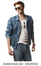 Fashion Portrait Of The Young  Man Wearing Jeans Jacket