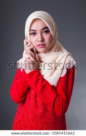 Fashion portraiture of young beautiful muslim woman wearing hijab
