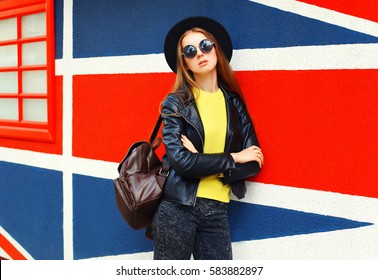 Fashion pretty young woman model over colorful background