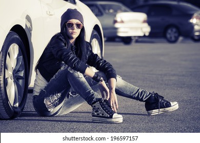 Fashion Punk Woman Sitting At The Car