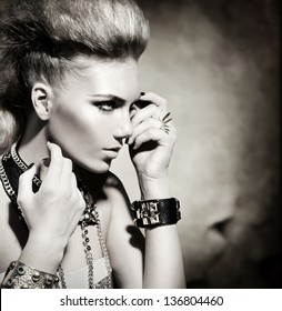 Fashion Rocker Style Model Girl Portrait. Hairstyle. Rocker Or Punk Woman Makeup And Hairdo. Black And White Portrait Of Glamour And Stylish Young Woman