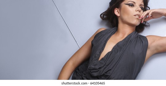 Fashion Shoot Of Sexy Lady Over Glass Background