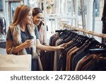 Fashion, shopping and friends with choice for clothes, sales and discount at luxury mall. Smile, retail store and customer with decision at boutique with funny women laughing or girls drinking coffee